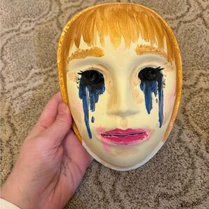 Artistic Painted Mask with Gold and Pink Accents